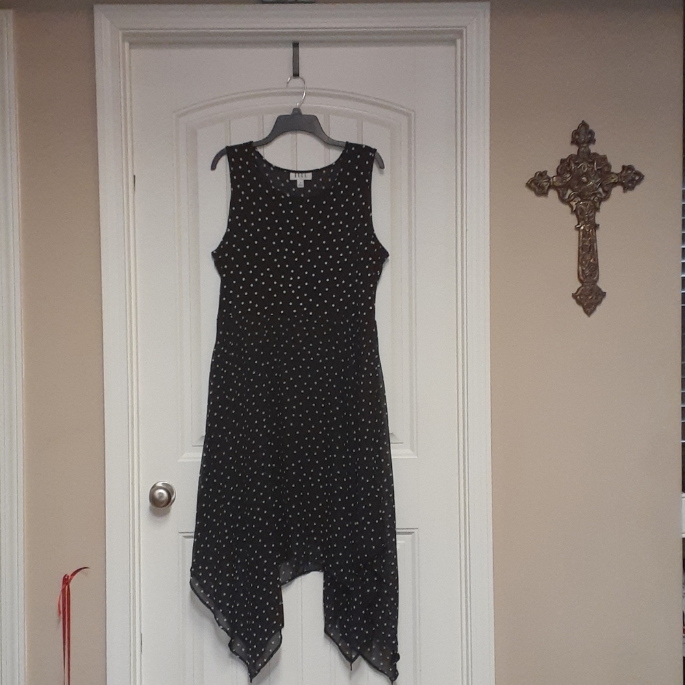 Elle handkerchief bottom black and white dress.